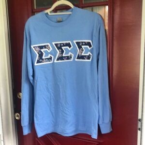 Wonen’s longsleeve Trisigma t-shirt